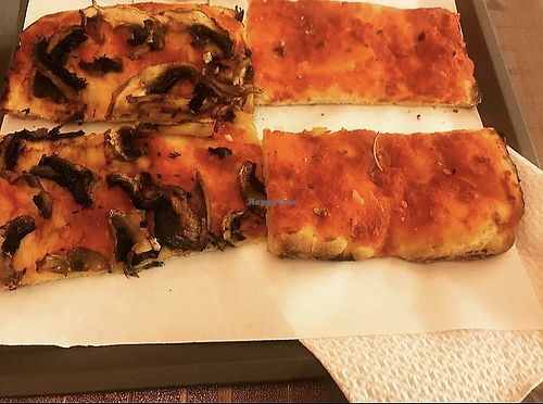 Vegan tomato with garlic & rosemary pizza and vegan tomato with mushroom pizza at Caesar Pizza in Rome