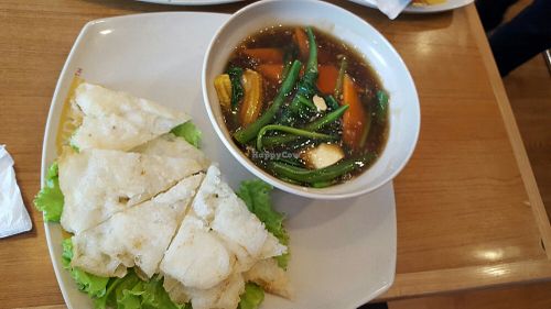 Pan fried Hor Fun (pan fried rice noodles cake? With stirfried veggies sauce! at Thai Express - Lotte in Hanoi