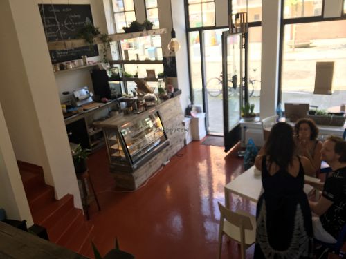 The counter and front, upstairs there is a large table also at Veggie in Rotterdam