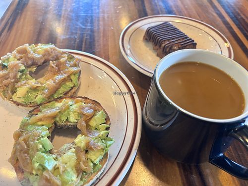 Avo bagel, Old Crow Energy Bar, and coffee with oat milk    at Red Rooster Coffee in Floyd