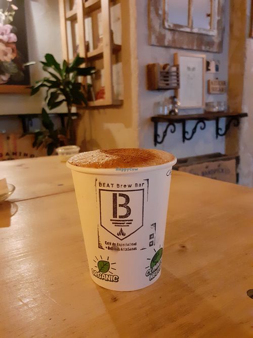 Superlatte of almond milk, cocoa, carob and alfalfa at BEAT Brew Bar in Valencia