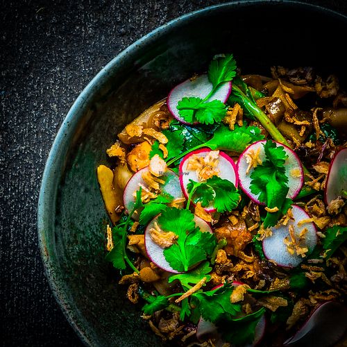 Biang Biang Noodles with Shiitake & Tofu, Yu Choi, Cucumber, Radish, Black Vinaigrette, Chili Oil at M Kokko in Durham