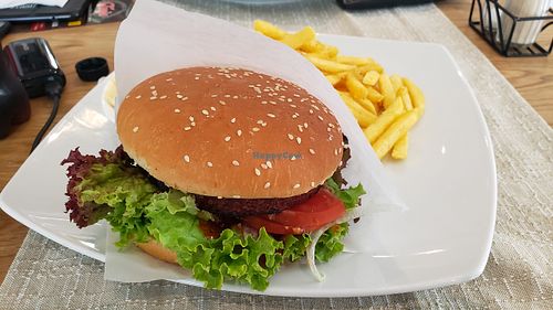 Vegan burger (beet) and fries.  at Pizzeria Troja in Zurich