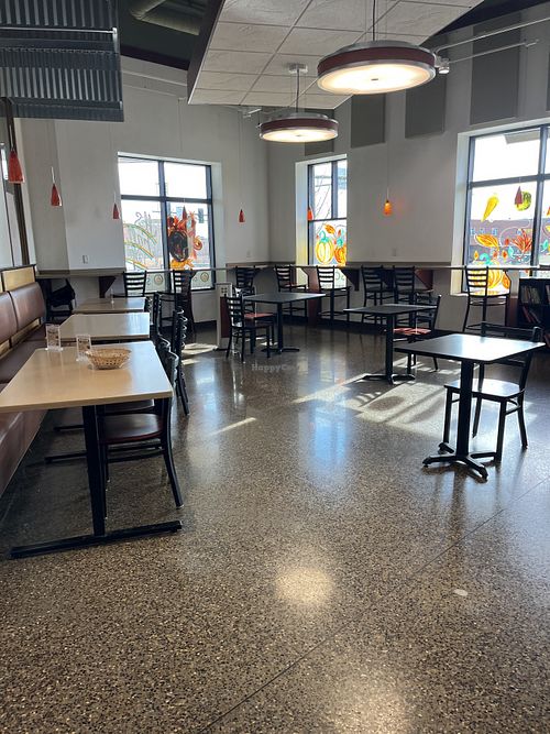 A seating area near the salad bar  at The People's Food Co-op in Rochester