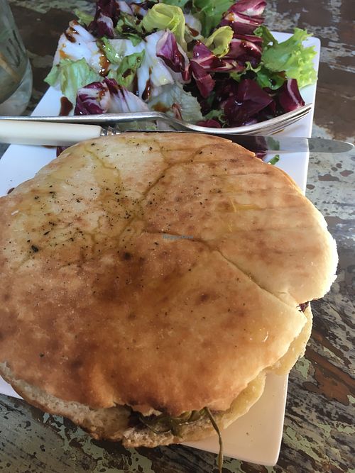 Puccia filled with cannellini bean and olive spread and chickory sprouts  at Sullaluna in Venice