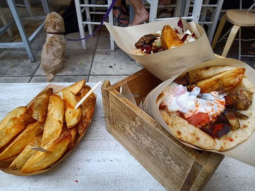 Souvlaki & extra potatoes. at Cookoomela Grill in Athens