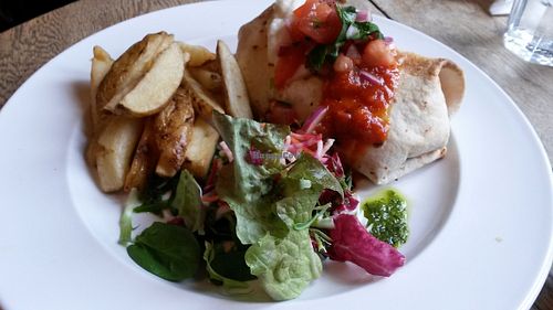 Refried bean & coconut chilli wrap served with sour cream, jalapeños & salad at The 78 in Glasgow