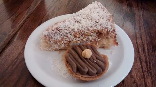 Pineapple-coconut cake and hazelnut-banana-chocolate pie at Hermans in Stockholm