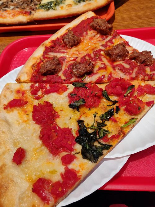 Vegan margherita and Beyond beef at NY Pizza Suprema in New York City