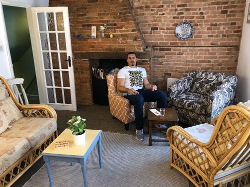 Daniel enjoying the layout of the cafe very comfy  at Okomoko in Farnham