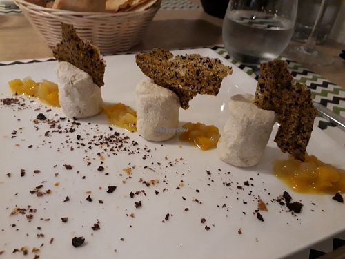 Cashew cream, seaweed crackers and mango. at MangioGiusto in Cagliari