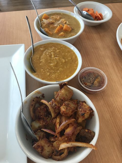 Vegan sides. Deviled potatoes, Dahl, squash curry, carrot pickles at Serendib in Ellsworth