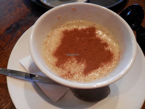 Porridge made with soy milk and sprinkled with cinnamon at Caffe Nero in Spalding