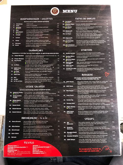 One side of the menu, updated with a total of 4 vegan options and some more vegetarian    at Cozy Creperie & Coffee Shop in Vejle