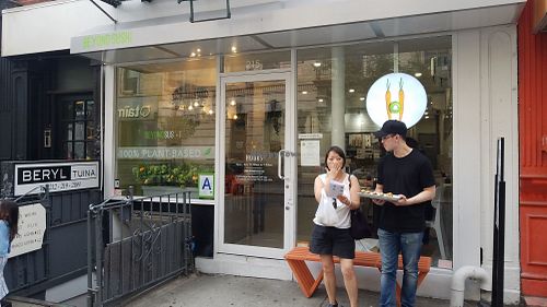 Sampling outside at Beyond Sushi - Mulberry St in New York City