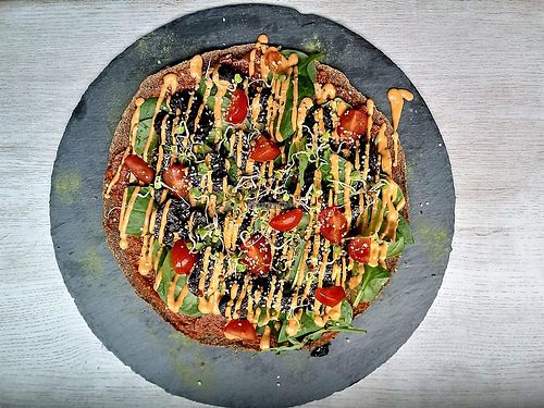 Pizza Cheddar Funghi at The Raw Kitchen Malmö in Malmo