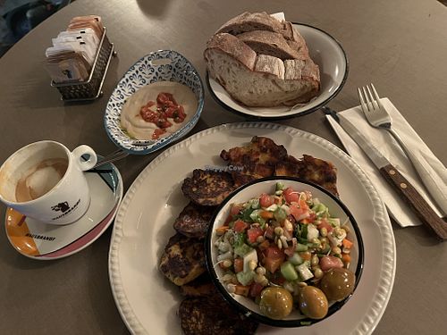 Veg pancakes with techina and salad  at Nehama Vahetzi in Tel Aviv