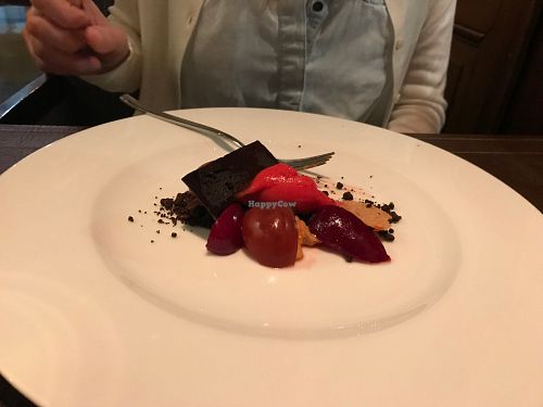 Plums from Mendoza in syrup with chocolate and peanuts. at Dario Gualtieri Bistro in Buenos Aires