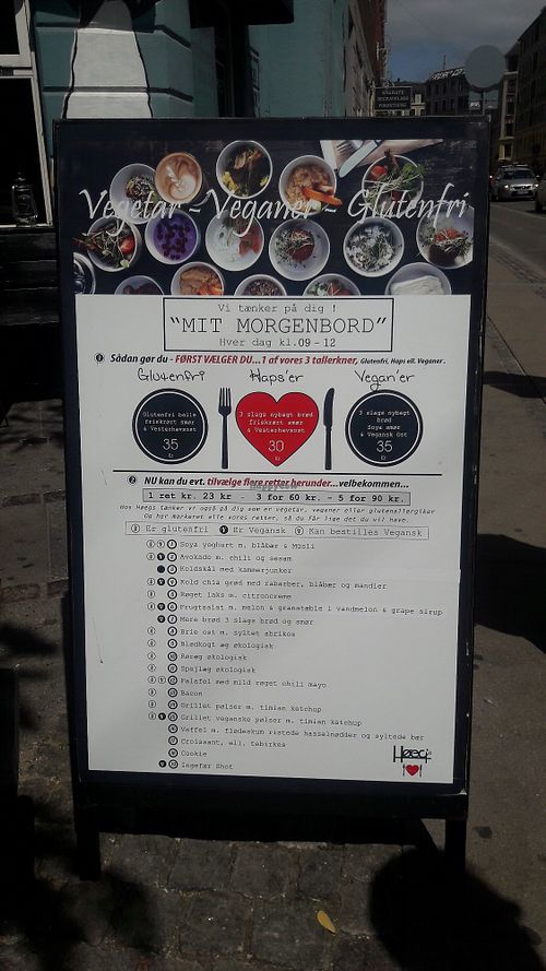 Breakfast menu with vegan options clearly marked at Cafe Hoegs in Copenhagen