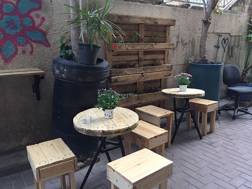 Outside seating at Golden Sun Kombucha in Tel Aviv