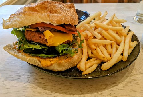 Beyond burger with bacon and fries at The Garden Cafe and Takeaway in Kendal