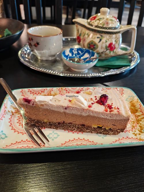 Strawberry cashew cake and green tea at Nirvana in Riga