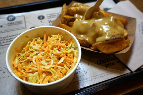 Potato Wedges w/cheese fondue + Coleslaw at Hank Cuisine Végétale - Rochechouart in Paris