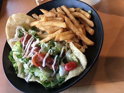 Fry bread taco with fries at Vida Eatery  in Bakersfield