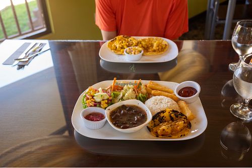 Front: veganized casado with yuca fries; Back: veganized tofu heart of palm tac at Monteverde Fusion in Monteverde
