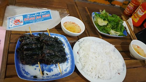 Veg-beed wrapped in herb and grilled, served with rice noodles, rice paper and sweet sour sauce at Tam An Lac - Dong Da District in Hanoi