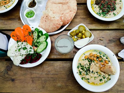 Mixed veggies and half/half hummus (regular, and with garlic and other stuff) at Mabsuta. at Mabsuta in Tel Aviv
