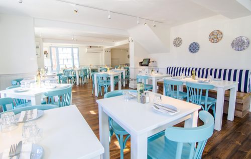 The Real Greek Dulwich, located on the sunny side of Dulwich Village high street, sees a spacious layout, and has been designed to recreate the relaxed Mediterranean experience of eating in Santorini.

It offers an authentic space for locals, families and visitors to the area to relax in and to and enjoy an array of traditional Greek cuisine, from Souvlaki Wraps and Mezes to share.

With seating for up to 100, guests can enjoy their food and drinks in the Santorini Island inspired interior, or al-fresco in the sunshine (weather permitting!)

 at The Real Greek - Dulwich in South East London