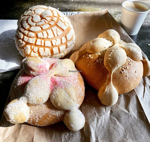 Vegan pan de muerto, vegan concha and cortado with oat milk   at Delicias Bakery in Los Angeles
