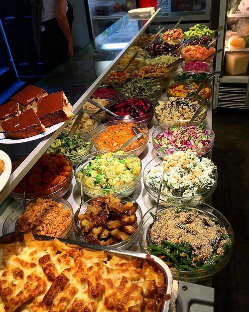 salad with pasta in the foreground  at Estin in Copenhagen