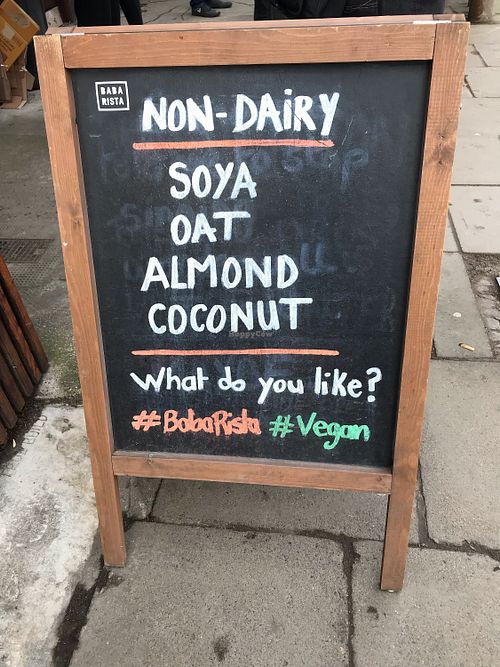 Plant milks sign in front of Baba Rista at Baba Rista in Edinburgh
