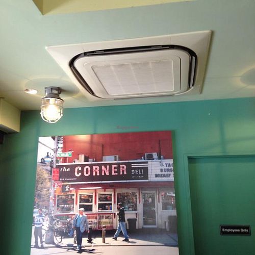 Photography of Downtown NYC on the Walls (this is La Esquina on Kenmare & Lafayette) at Eat More Greens in Tokyo