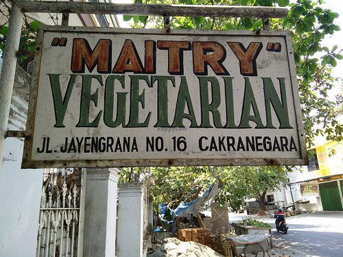 Street sign for the restaurant at Maitry in 