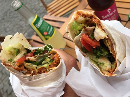 Half way through our delicious sandwiches. at Mr. CigKofte in Bucharest