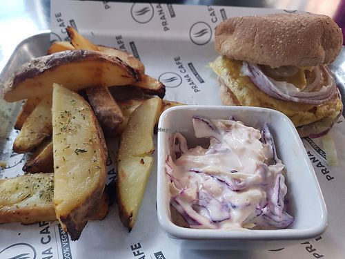 Chickn burger with wedges and coleslaw at Prana Cafe in Leicester