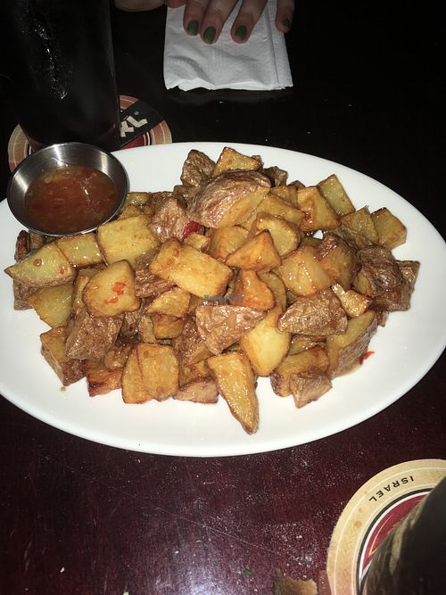 Potato with chili sauce  at Syncopa Bar in Haifa