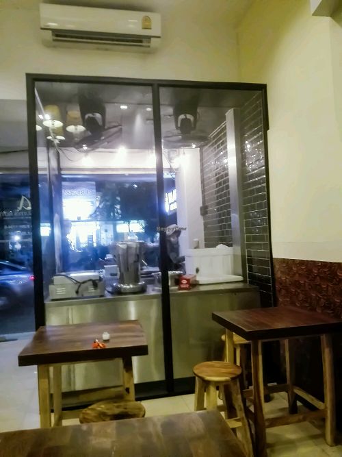Inside looking out at Falafel Michelin in Bangkok