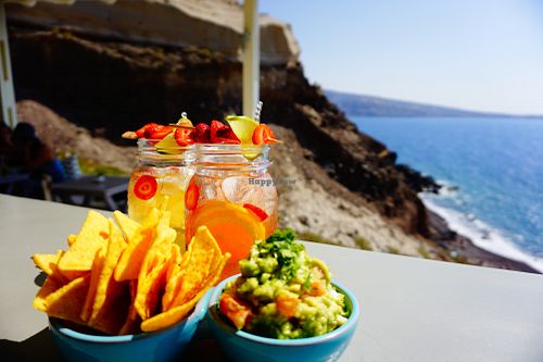guacamole & chips with sangria...chill afternoon in the sun at Katharos Lounge in Santorini