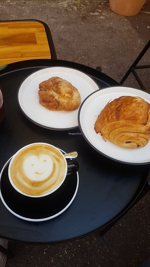 Awesome oat cappuccino and half a cinnamon bun and pain au chocolat (had to share with the other half)... delicious food and very lovely service. Recommended at Deep Coffee Roaster in Marseille