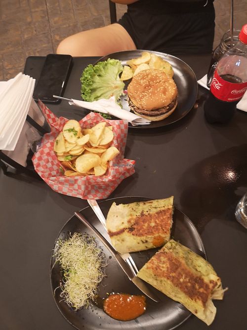 Hamburguesa vegetariana, papas, burrito at Surf Caf in Cancun
