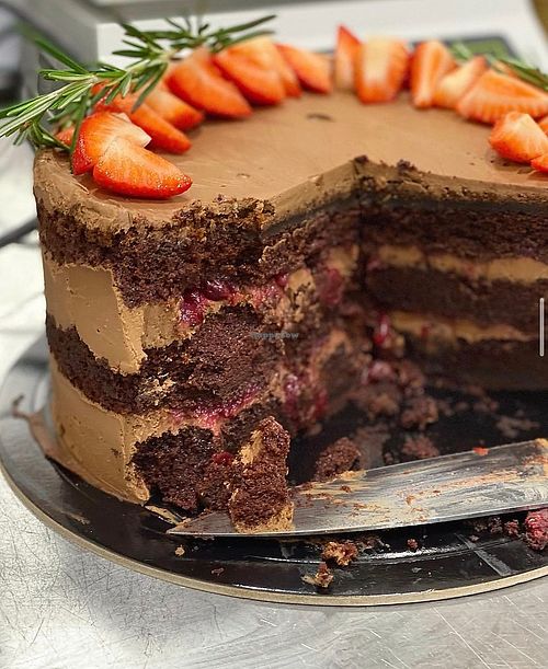 Vegan chocolate cake with cherry filling and  coconut cream. Photo by Seldereybar at Selderei in Krasnodar