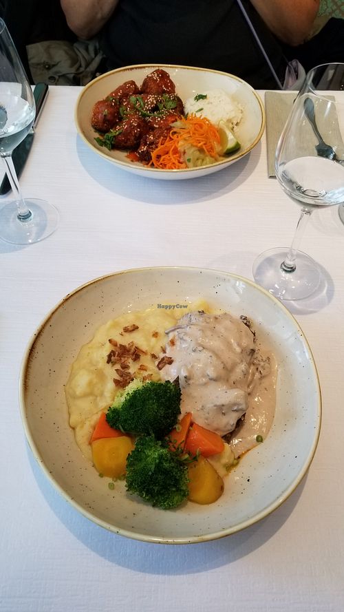 Vegloaf (foreground) and Korean style cauliflower (across table) at HILTL - Sihlstrasse in Zurich