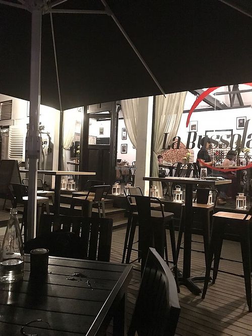 Restaurant at night, taken from outside seating. at La Bussola in West Singapore