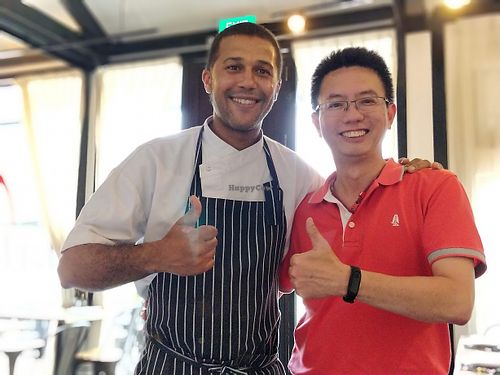 Friendly Chef Carlo with HappyCow Ambassador at La Bussola in West Singapore