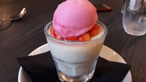 Lemon & strawberry posset with raspberry sorbet at Artisan Ribble Valley in Whalley