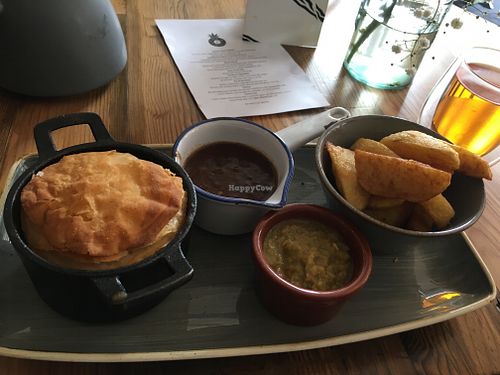 Mushroom & Guinness pie, mushy peas, red wine gravy & chips  at Folk & Soul in Manchester
